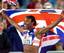 Britain's Denise Lewis celebrates after winning the gold medal in the heptathlon at the Summer Olympics, Sunday, Sept. 24, 2000, at Olympic Stadium in Sydney.