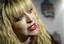 U.S. singer Courtney Love, seen as she attends the NME 2010 awards, in south London, Wednesday, Feb. 24, 2010. (AP Photo/Joel Ryan)