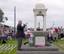 The Last Post is played at an ANZAC Day ceremony in Port Melbourne, Victoria. Similar ceremonies are held in most suburbs and towns.