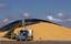 A grain transport truck is loaded up with corn, harvested in the fall of 2007, in Curran, Ill., Friday, March 14, 2008. Food prices have come under pressure because of the increased demand for corn in ethanol production. (AP Photo/Seth Perlman)hg3