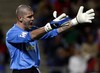 Barcelona's Victor Valdes gestures during the Spanish League soccer match between FC Barcelona and Recreativo de Huelva at the Colombino stadium in Huelva.