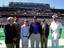 Rice University President Dr. Malcolm Gillis joins Naval Academy Assistant Athletic Director Eric Ruden, Pierce Bush, former President George H.W. Bush, Secretary of the Navy Gordon R. England, and Naval Academy Superintendent Vice Adm. Rodney Rempt.