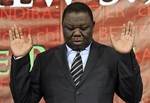 File - Zimbabwe's Prime Minister Morgan Tsvangirai attends a memorial service at a local church held to remember those killed during Zimbabwe's election violence, in Harare, Wednesday, April, 6, 2011.