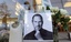 A tribute to Apple's Steve Jobs takes shape at the Apple store at Crocker Park in Westlake, Ohio on Thursday, Oct. 6, 2011.