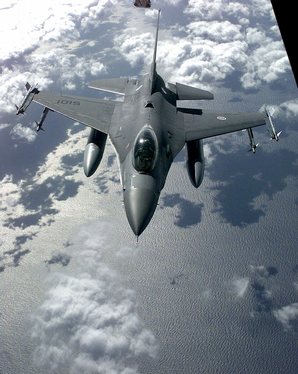 A Portuguese F-16 refueling in mid flight.