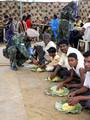 INDIA-CRPF-DISTRABUTING-FOODCRPF jawan seen distributing food to the villagers of Chandabila in Jhargram in a CRPF 148 Bn public relation camp on Monday.// CRPF jawans seen distributing medicine to the patients in the health check up camp at Chandabila in Jhargram in Eastern India ------ WN/BHASKAR MALLICK