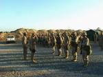 File- Major General (MGEN) James N. Mattis, USMC, Commanding General, 1st Marine Division (MAR DIV), returns a salute from Marines of 1st Battalion (BN) 4th Marines about to be promoted, at Camp Commando, Kuwait while forward deployed in support of Operation enduring Freedom.