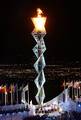 The Olympic flame burns at Rice-Eccles Stadium. Salt Lake City hosted the 2002 Winter Olympics.