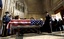 A casket containing the body of Staff Sgt. Jorge Oliveira is covered in a U.S. flag at the Cathedral Basilica of the Sacred Heart during funeral services, Friday, Oct. 28, 2011, in Newark, N.J.