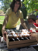 Kathy serves cupcakes