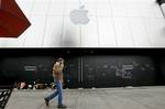 Messages honoring Steve Jobs are scrawled on blacked-out windows and doors on an Apple Store, closed for the day, Thursday, Oct. 6, 2011, in Seattle.