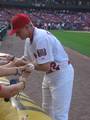 David Eckstein signing autographs before a May 30th game against the Astros in 2006 as a member of the Cardinals.