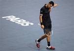 Novak Djokovic of Serbia reacts during this match against Viktor Troicki of Serbia in the Paris Tennis Masters tournament, Thursday, Nov.10, 2011, in Paris, France.