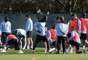 Manchester City's Mario Balotelli, centre, trains with teammates at Carrington training ground, Manchester, England, Tuesday Nov. 1, 2011. Manchester City will play Villarreal in Spain on Wednesday in a Champions League Group A soccer match, Thursday.