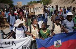 Protesters march to the Nepal U.N. base in Mirebalais, Haiti, Friday Oct. 29, 2010. Protesters who blame U.N. peacekeepers from Nepal for Haiti's widening cholera  epidemic marched on a rural military base Friday to demand the soldiers leave the country.