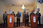 SOMALIA, Mogadishu: In a handout photograph released by the African Union-United Nations Information Support Team, Chairperson of the African Union Commission Jean Ping (2nd right) speaks at a joint press conference with the Somali President Sheikh Sharif Sheikh Ahmed (2nd left) at Villa Somalia, the complex that houses the Transitional Federal Government (TFG) in Mogadishu 20 August, during a one-day visit to the Somali capital. Ping, who meet with AMISOM commanders the leadership of the TFG, s