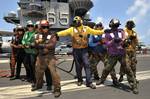 Sailors conduct a firefighting training exercise aboard USS Enterprise (CVN 65).