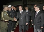  King Abdullah II of Jordan, right, welcomes the Russian President Vladimir Putin, center, on his arrival in Amman, Jordan, late Monday, Feb. 12, 2007. (dn1) 