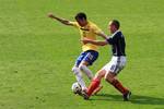 Sandro playing for Brazil in a friendly against Scotland in March 201