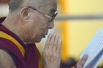 Tibetan Buddhist leader & Nobel peace laureate, His Holiness the 14th Dalai Lama joins in prayers in sympathy for those who have died and others who have been injured in recent protests in Tibet at the Main Tibetan temple in Dharamshala, India, on October 19, 2011.