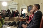 President Barack Obama, right, with Australian Prime Minister Julia Gillard, left, during their meeting in the Oval Office of the White House, Monday March, 7, 2011, in Washington.