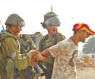 Soldiers arresting Ashraf Abu Rahma 