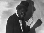 Bert Williams was the only black member of the Ziegfeld Follies when he joined them in 1910. Shown here in blackface, he was the highest-paid African American entertainer of his day.[48]