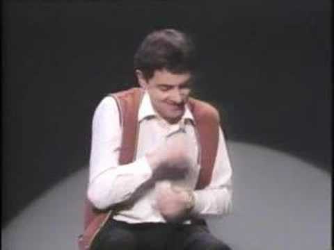 Rowan Atkinson Live - Plays Invisible Drums