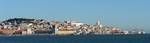 Partial view of old quarter of Lisbon (viewed from Cacilhas), showing the Praça do Comércio(bottom left), Castelo de São Jorge (upper left), and in the central portion of the image, the Alfama district (including Monastery of São Vicente da Fora and Church of Santa Engrácia)