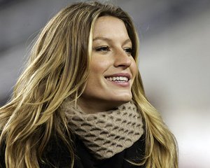  Brazilian super model Gisele Bundchen is seen at the Jets Patriots NFL game in Foxborough, Mass., Sunday, Dec. 4, 2005. Bundchen appeared at the game to promote the Victoria Secret fashion show to be seen on CBS television, which was also broadcasting th