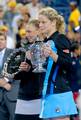 Kim Clijsters and Vera Zvonareva during the trophy ceremony on Day 13 of the 2010 US Open at the USTA Billie Jean King National Tennis Center Queens, New York September 11, 2010