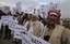 Pakistanis chant slogans during a protest to condemn NATO helicopters attacks on Pakistani troops, in Islamabad, Pakistan, Thursday, Dec. 1, 2011.