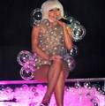 Gaga wearing a plastic bubble dress while performing on The Fame Ball Tour