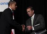 President Barack Obama is greeted by House Minority Leader John Boehner of Ohio, before speaking to Republican lawmakers at the GOP House Issues Conference, in Baltimore, Friday, Jan. 29, 2010.