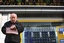 A man checks time outside a securities firm in Tokyo, Japan, Wednesday, Jan. 7, 2009. The Nikkei Stock Average rose 2 percent in the morning trading.