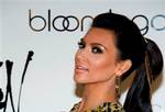 Kim Kardashian appears at Bloomingdale’s to promote her Belle Noel jewelry line, in New York, Wednesday, Sept. 21, 2011. (AP Photo/Charles Sykes)