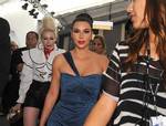 Kim Kardashian arrives at the Lincoln Center main tent during Fashion Week, Tuesday, Sept.13, 2011, in New York. (AP Photo/ Louis Lanzano)