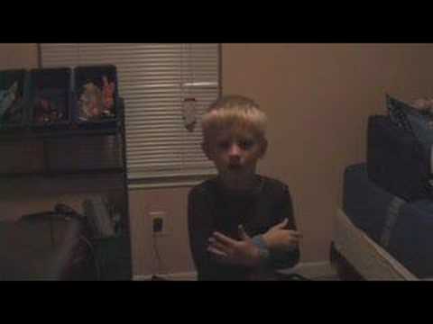 Kid singing Britney Spears scared to death by his mom