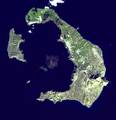 Satellite image of the islands of Santorini. This location is one of many sites purported to have been the location of Atlantis