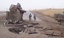 File - General Lee lies on its side aftrer surviving a buried IED blast in 2007 , while conducting operations just south of the Shiek Hamed village in Iraq.