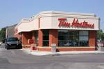 A Tim Hortons in Calgary, Alberta.Tim Hortons Inc. (TSX: THI, NYSE: THI) is a Canadian coffee shop known for its coffee and doughnuts.