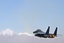 File - An F-15E Strike Eagle roars into the sky Oct. 6, 2011, over Afghanistan.