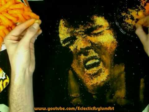 Elvis Presley Painting with Cheese Puffs on Velvet - Cheesy Art in Cheetos