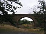 .Historic Railway Bridge, Riddells Creek is situated on the southern foothills of the Macedon Ranges. Riddells Creek is home to two historic railway bridges and is surrounded by natural bushland. There is also a small creek that runs through the town at Wybejong Park.