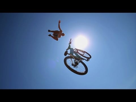 Huge Bike Jump into a Pond 35 feet in the air