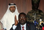 File - The leader of the Sudanese rebel group Justice and Equality Movement (JEM), Khalil Ibrahim, speaks during a press conference in Doha, Monday March 29, 2010, criticizing the Sudanese government and accusing it of not implementing the Doha framework agreement.