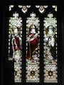 Wilfrid (right), with saints Cuthbert (centre) and Aidan (left), depicted in a stained-glass window in a modern church near Acomb, Northumberland