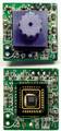 Webcams typically include a lens (shown at top), an image sensor (shown bottom), and supporting circuitry.