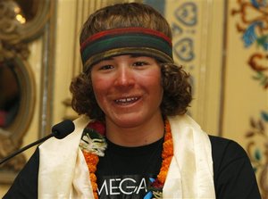 Jordan Romero, the 13-year-old American who on Saturday became the youngest climber to reach the summit of Mount Everest, gestures as he speaks to reporters in Katmandu, Nepal, Thursday, May 27, 2010. Romero, from Big Bear, California, told reporters Thursday in Katmandu that he plans to climb the 8,201-meter (26,906-foot) Mount Cho Oyu, the world's sixth highest peak, during the autumn climbing season. Cho Oyu straddles the Nepal-China border.