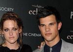 Actors Kristen Stewart (L) and Taylor Lautner attend The Cinema Society Screening Of 